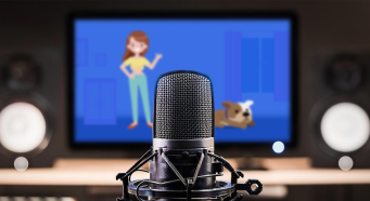 Microphone in front of a television featuring animation.